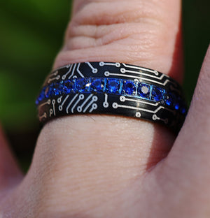 Open image in slideshow, Black Tungsten Ring with Blue Gems and Computer Circuit Engraved Pattern, Synthetic Sapphires, Blue Stones, Hacker Motherboard Ring - 8mm - The Veil
